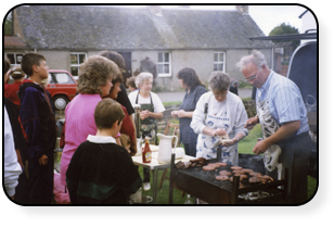 Dunning Burn Barbeque Cooking the Burgers